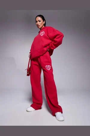 Kaiia Joggers rojos y rosas de pernera ancha con cinturilla ancha y logo de corazón en contraste de (parte de un conjunto)