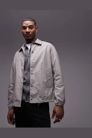 ARKET Chaqueta gris claro ligera con botones de presión metálicos en la parte delantera de