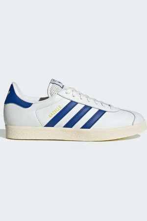 adidas Zapatillas de color blanco, azul real y crema Gazelle de