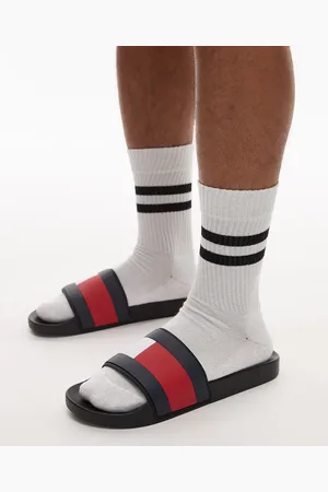 Tommy Hilfiger Sandalias negras de goma con detalle de bandera de
