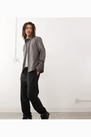 COLLUSION Joggers negros de