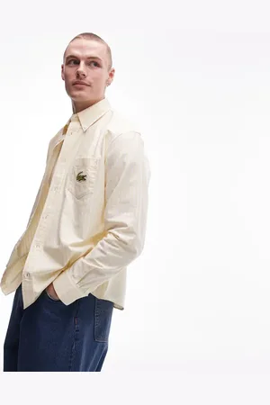 Lacoste Camisa amarilla y blanca a rayas verticales de manga larga de