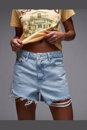 Topshop Pantalones cortos vaqueros descoloridos de corte acampanado con diseño rasgado de -Azul