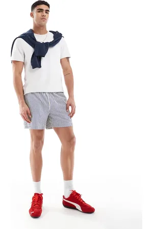 ASOS Pantalones muy cortos a rayas azules y blancas de corte ancho de