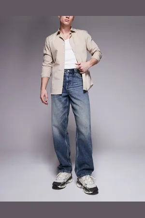 ASOS Vaqueros holgados con lavado azul oscuro de