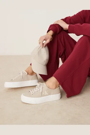 Calvin Klein Zapatillas de deporte beis con plataforma plana de lona Vulc de -Neutro
