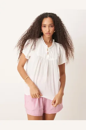 JDY Blusa blanca con detalle de lazada y diseño bordado de