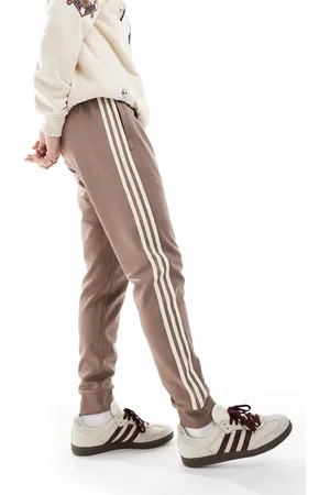 adidas Pantalones de chándal marrones SST de -Marrón