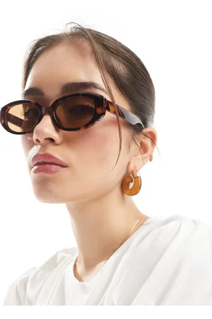 AJ Morgan Gafas de sol efecto carey con montura ovalada gruesa y lentes color ámbar de