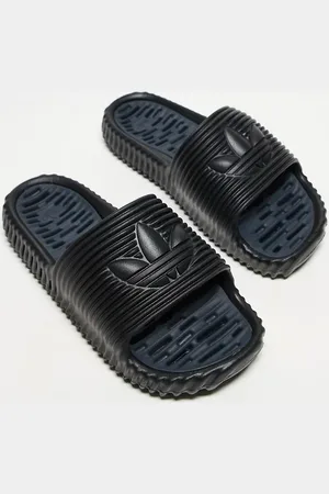 adidas Chanclas negras y grises Adilette 25 de -Negro