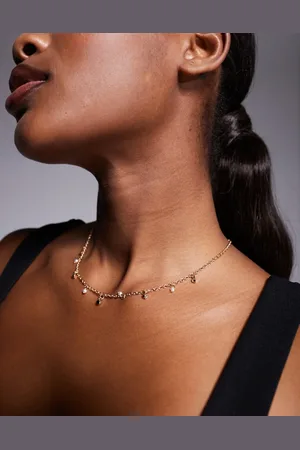 True Decadence Collar con charms largos de cristales de