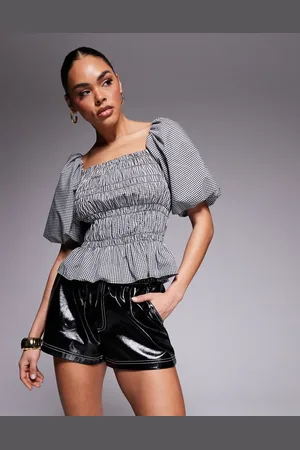 River Island Top fruncido con mangas abullonadas y estampado floral de