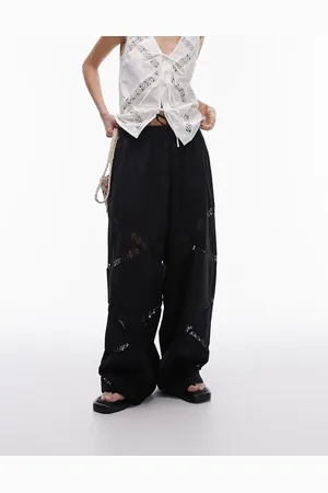Topshop Pantalones negros de pernera ancha elásticos con insertos de encaje de lino de