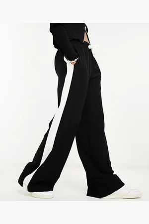ASOS Pantalones negros sin cierres con panel en contraste de