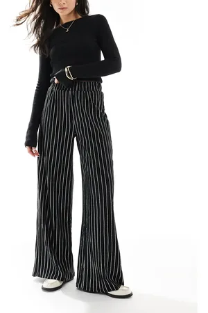 ONLY Pantalones negros con raya diplomática de pernera ancha de tejido texturizado de