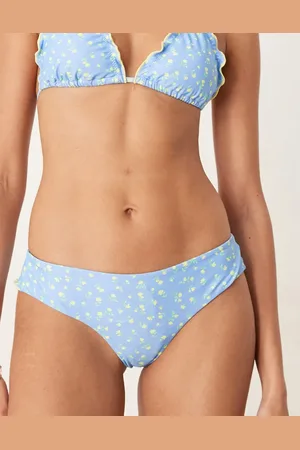 Kulani Kinis Tanga de bikini con estampado floral amarillo limón y bordes ondulados de