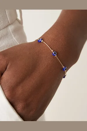 ASOS Pulsera de la amistad dorada con detalle de ojos de