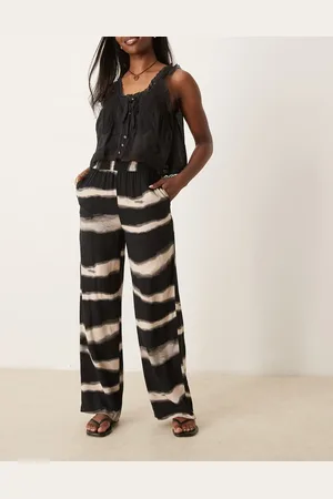 JDY Pantalones negros de pernera ancha con estampado abstracto de