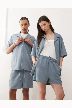 Reclaimed Pantalones cortos azules unisex de pana de