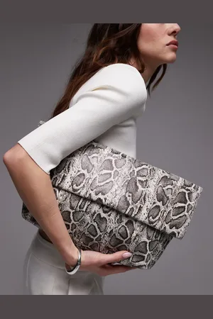 Topshop Bolso clutch de mano plegado con estampado de piel de Georgia de -Multicolor