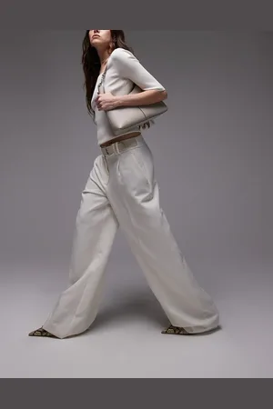MANGO Pantalones blancos de pernera recta con hebilla en la cinturilla de
