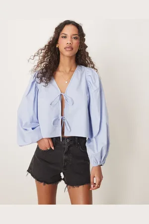 Gina Tricot Blusa con lazadas delanteras y mangas voluminosas de