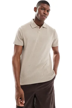 New Look Polo marrón claro de manga corta de tejido texturizado de