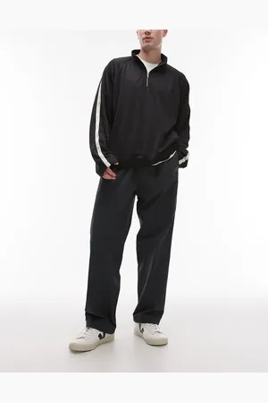 ARKET Pantalones oscuro holgados y técnicos con cordón ajustable en la cintura de nailon de