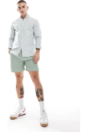 Farah Shorts de baño verdes y blancos a rayas de sirsaca Colbert de