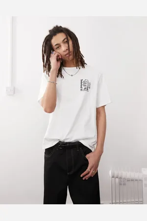 Timberland Camiseta blanca con logo estampado en la espalda con cajas de zapatos de