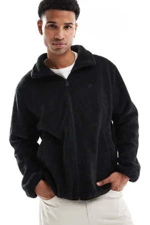 New Era Chaqueta negra con cremallera y estampado trasero de borreguito de
