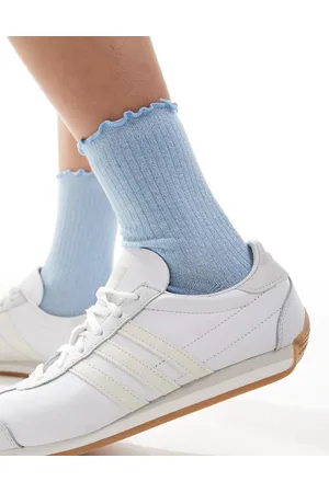 VERO MODA Calcetines azules con acabado de purpurina y borde de volantes de canalé de