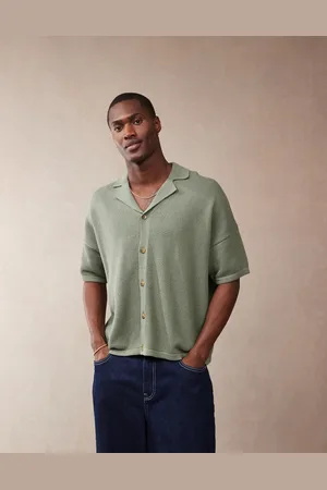 ASOS Polo abotonado de corte cuadrado extragrande con cuello de solapas de punto texturizado de
