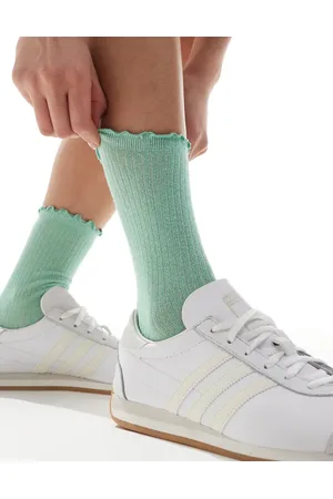 VERO MODA Calcetines verdes con acabado de purpurina y borde de volantes de canalé de