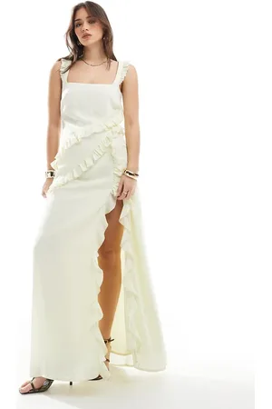 The Frolic Vestido largo amarillo crema con escote cuadrado, diseño drapeado de volantes y abertura hasta el muslo exclusivo de