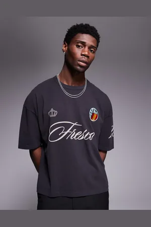 ASOS Camiseta lavado de corte cuadrado extragrande con estampado gráfico deportivo y parche de