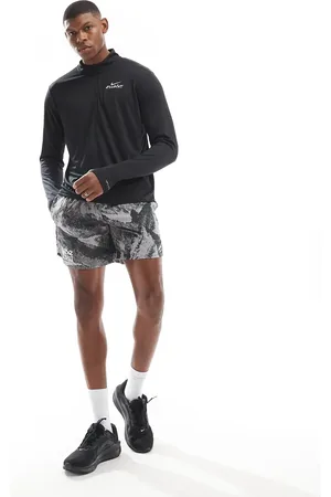 Nike Camiseta negra de manga larga con media cremallera Pacer Flash de