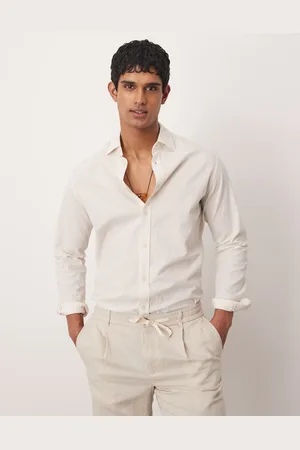 MANGO Camisa a rayas beis y blancas de manga larga de sirsaca de
