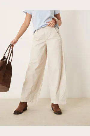 Free People Pantalones chinos color holgados Rylee de -Blanco