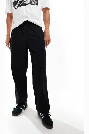 SELECTED Pantalones negros sueltos de popelina ligera de