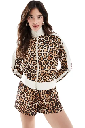 PUMA Chaqueta de chándal con estampado de leopardo T7 de