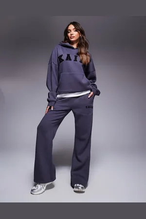 Kaiia Joggers oscuro de pernera ancha con logo bordado de (parte de un conjunto)