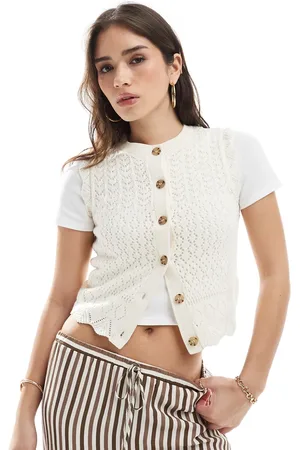 New Look Chaleco color abotonado con detalles calados de -Blanco
