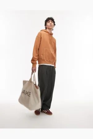 ARKET Sudadera naranja terracota holgada con capucha de tejido rizado de