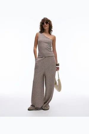 Topshop Pantalones marrones y color crudo a rayas de talle bajo de punto de