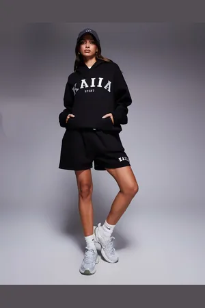 Kaiia Pantalones cortos de chándal negros con logo bordado de (parte de un conjunto)