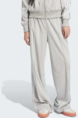 adidas Pantalones de chándal grises sueltos Firebird de