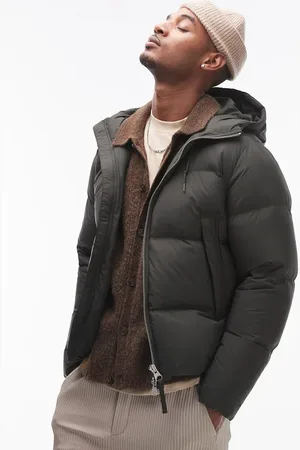 ARKET Chaqueta caqui oscuro acolchada con capucha de
