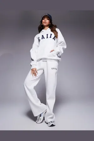 Kaiia Joggers claro jaspeado de pernera ancha con logo bordado de (parte de un conjunto)
