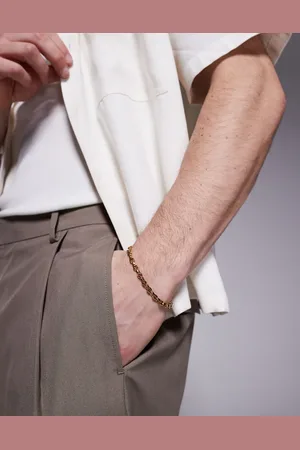 ASOS Pulsera dorada estilo cadena de acero inoxidable resistente al agua de